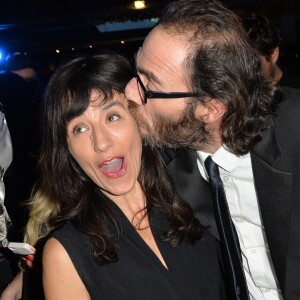 Romane Bohringer et son compagnon Philippe Rebbot - Cocktail lors de la présentation de la nouvelle étoile de la galaxie "Angel" de Thierry Mugler avec sa nouvelle égérie Georgia May Jagger à la Coupole du Printemps Haussmann à Paris, le 30 janvier 2015.