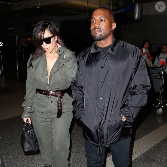 Kim Kardashian et Kanye West à l'aéroport de Los Angeles le 24 mai 2016