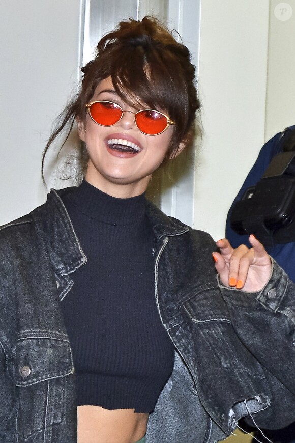 Selena Gomez arrive à l'aéroport de Tokyo, le 1er août 2016.