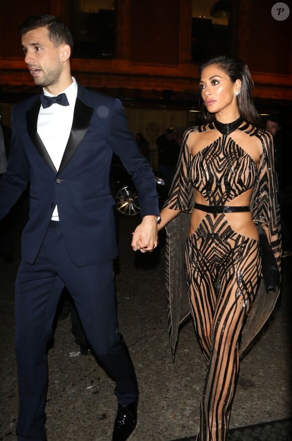 Nicole Scherzinger et son compagnon Grigor Dimitrov quittent la soirée des British Fashion Awards à Londres le 5 décembre 2016.