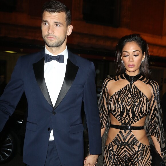 Nicole Scherzinger et son compagnon Grigor Dimitrov quittent la soirée des British Fashion Awards à Londres le 5 décembre 2016.