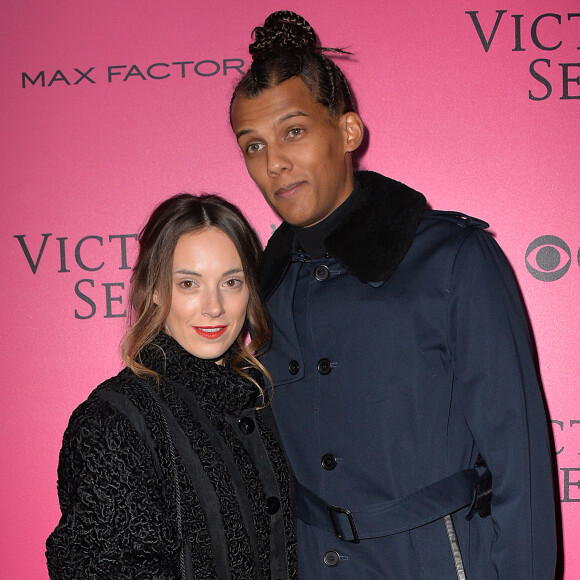 Stromae et sa femme Coralie au défilé "Victoria's Secret Paris 2016" au Grand Palais à Paris, le 30 novembre 2016. © BOV/Bestimage