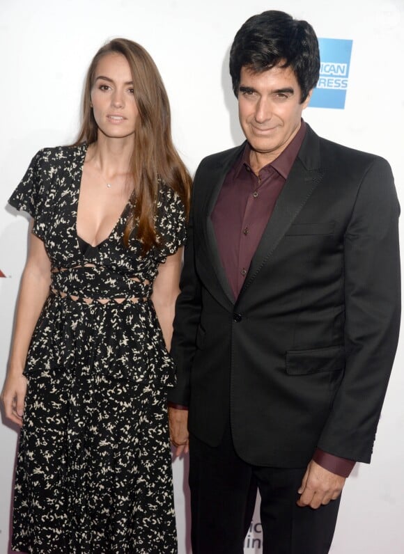 David Copperfield et sa compagne Chloe Gosselin à la soirée 2016 Billboard Women à New York, le 9 décembre 2016