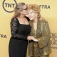 Debbie Reynolds et Carrie Fisher - Press room lors de la 21ème cérémonie annuelle des "Screen Actors Guild Awards" à l'auditorium "The Shrine" à Los Angeles, le 25 janvier 2015.