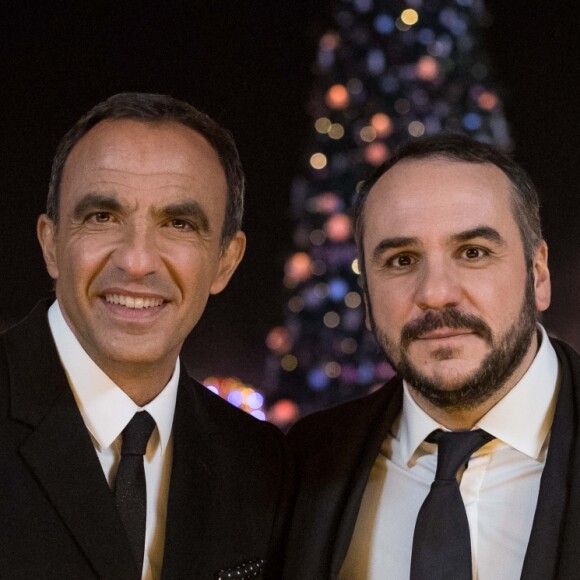 Exclusif - Nikos Aliagas et François-Xavier Demaison lors de l'enregistrement de l'émission "Toute la musique qu'on aime" à Disneyland Paris, le 12 décembre 2016. L'émission sera présentée par Nikos Aliagas et diffusée sur TF1 le 31 décembre. © Cyril Moreau / Bestimage
