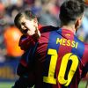 Lionel Messi et son fils Thiago Messi - Les joueurs du FC Barcelone posent avec leurs enfants avant le match contre El Rayo à Barcelone, le 8 mars 2015.