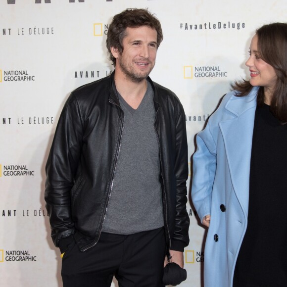 Marion Cotillard enceinte et son compagnon Guillaume Canet - Avant première du documentaire "Before the flood" au théâtre du Chatelet à Paris le 17 octobre 2016.