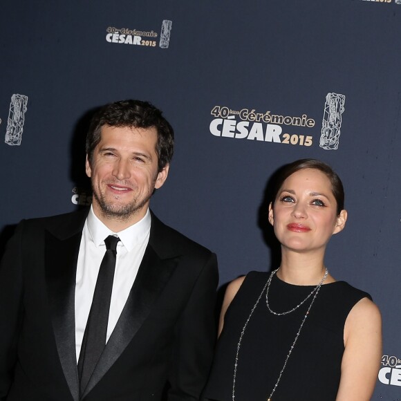 Guillaume Canet et Marion Cotillard - Photocall de la 40ème cérémonie des César au théâtre du Châtelet à Paris. Le 20 février 2015.