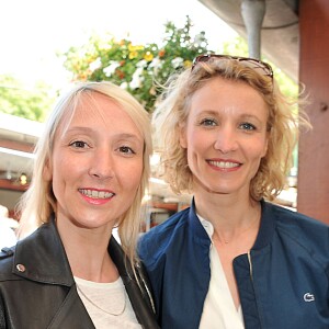 Audrey Lamy et sa soeur et Alexandra Lamy - Jour 8 - People au Village lors des Internationaux de France de tennis de Roland Garros le 2 juin 2013.