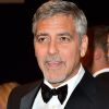 George Clooney - Descente des marches du film "Money Monster" lors du 69ème Festival International du Film de Cannes. Le 12 mai 2016.