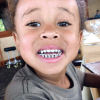King Cairo (4 ans), le fils de Blac Chyna et Tyga, prenant la pose avec des grillz aux dents au Costa Rica le 29 janvier 2017