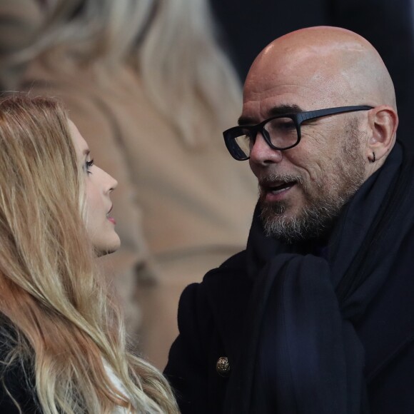 Pascal Obispo et sa femme Julie Hantson au match de ligue 1 Paris Saint-Germain (PSG) - AS Monaco (1-1) au Parc des Princes à Paris, le 29 janvier 2017.