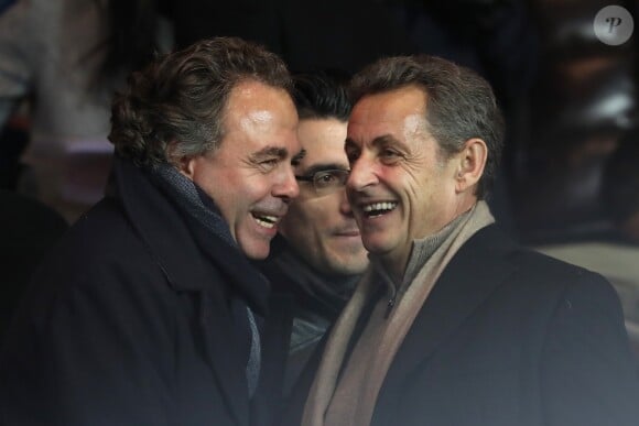 Luc Chatel et Nicolas Sarkozy au match de ligue 1 Paris Saint-Germain (PSG) - AS Monaco (1-1) au Parc des Princes à Paris, le 29 janvier 2017.
