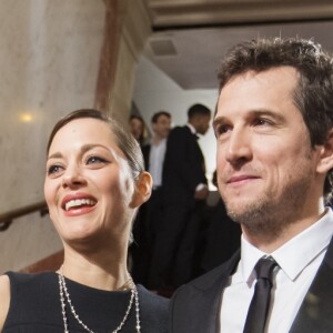 Guillaume Canet et sa compagne Marion Cotillard - 40e cérémonie des César au théâtre du Châtelet à Paris, le 20 février 2015.