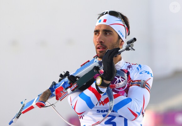 Le biathlète Martin Fourcade remporte une 2e médaille d'or en gagnant la course de 20 km en biathlon aux Jeux Olympiques d'Hiver de Sotchi en Russie, le 13 février 2014.
