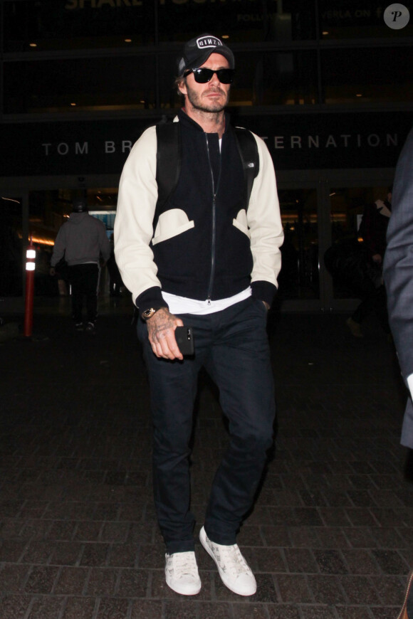 David Beckham arrive à l'aéroport LAX de Los Angeles, le 29 janvier 2017.