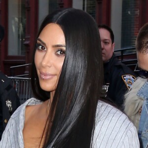 Kim Kardashian et son attaché de presse Simon Huck se baladent dans les rues de New York, le 14 février 2014.