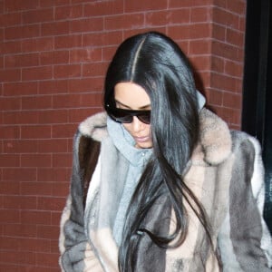 Kim Kardashian quitte l'hôtel Mercer lors de la fashion week de New York le 14 février 2017.