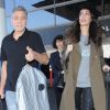 George Clooney et sa femme Amal arrivent à l'aéroport à Los Angeles le 27 janvier 2017