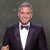 George Clooney reçoit le César d'honneur des mains de Jean Dujardin, sous le regard de sa femme Amal - 24 février 2017