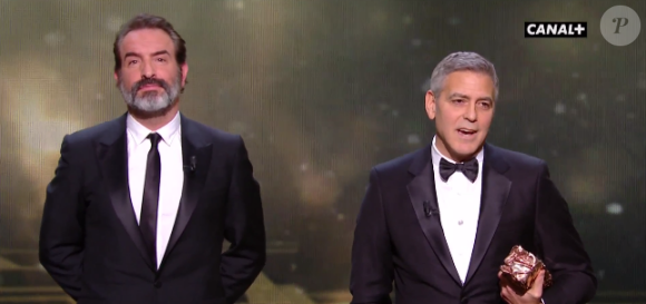 Jean Dujardin et George Clooney pendant les César 2017.