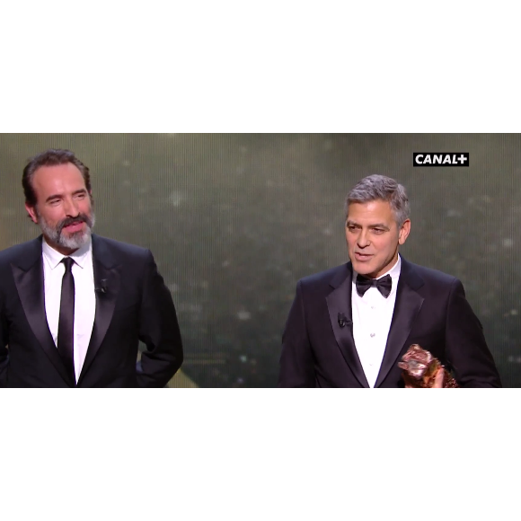 Jean Dujardin et George Clooney pendant les César 2017.