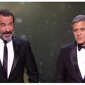 Jean Dujardin et George Clooney pendant les César 2017.