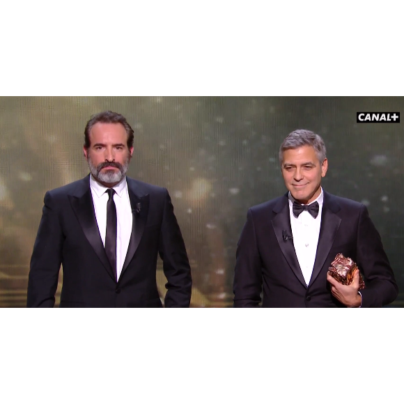 Jean Dujardin et George Clooney pendant les César 2017.