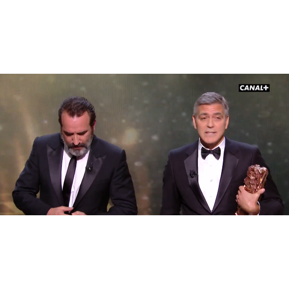 Jean Dujardin et George Clooney pendant les César 2017.