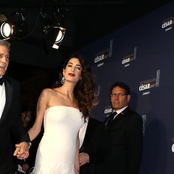 George Clooney et sa femme Amal Alamuddin-Clooney (enceinte) arrivant à la 42e cérémonie des César à la Salle Pleyel à Paris le 24 février 2017. © Olivier Borde / Dominique Jacovides / Bestimage
