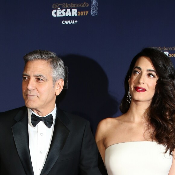 George Clooney et sa femme Amal Alamuddin-Clooney (enceinte) arrivant à la 42e cérémonie des César à la Salle Pleyel à Paris le 24 février 2017. © Olivier Borde / Dominique Jacovides / Bestimage