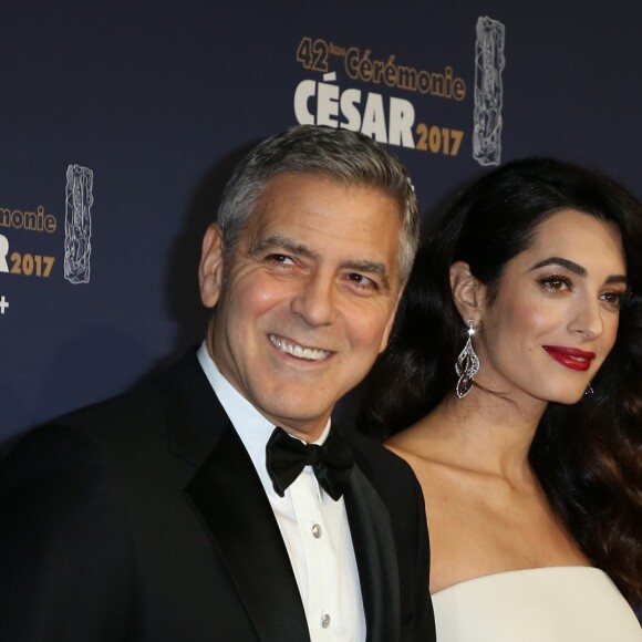 George Clooney et sa femme Amal Alamuddin-Clooney (enceinte) arrivant à la 42e cérémonie des César à la Salle Pleyel à Paris le 24 février 2017. © Olivier Borde / Dominique Jacovides / Bestimage