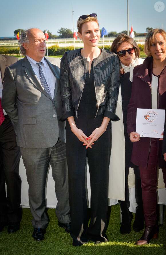 La princesse Charlene de Monaco assiste au premier "Charity Mile" - une course hippique caritative rebaptisée Prix princesse Charlene de de Monaco à l'hippodrome de la Côte d'Azur de Cagnes-sur-mer le 25 février 2017.