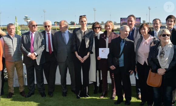 La princesse Charlene de Monaco assiste au premier "Charity Mile" - une course hippique caritative rebaptisée Prix princesse Charlene de de Monaco à l'hippodrome de la Côte d'Azur de Cagnes-sur-mer le 25 février 2017.