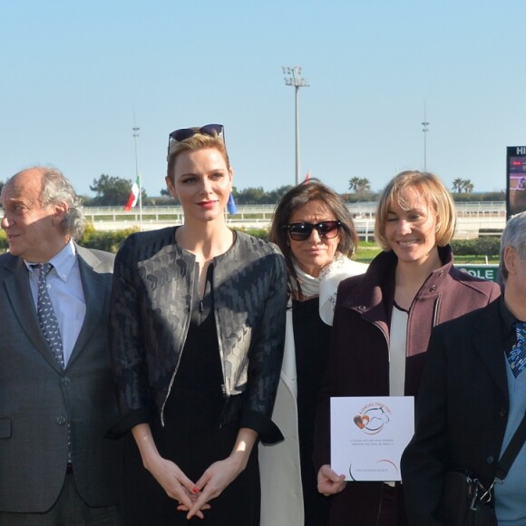 La princesse Charlene de Monaco assiste au premier "Charity Mile" - une course hippique caritative rebaptisée Prix princesse Charlene de de Monaco à l'hippodrome de la Côte d'Azur de Cagnes-sur-mer le 25 février 2017.