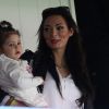 Emilie Nefnaf (Nef Naf) avec sa fille Maëlla assistent au match de football Psg (3) contre Reims (0) au Parc des Princes à Paris le 5 avril 2014.