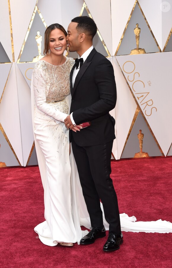 John Legend et sa femme Chrissy Teigen - Les célébrités arrivent à la 89ème cérémonie des Oscars au théâtre Dolby, le 26 février 2017.