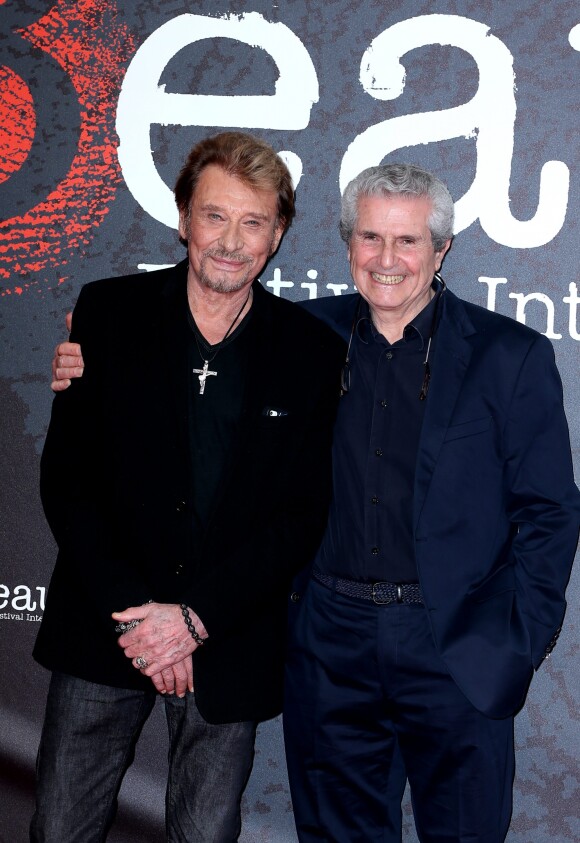 Johnny Hallyday et Claude Lelouch - Soirée d'ouverture du 6ème Festival International du Film Policier de Beaune avec un hommage à Johnny Hallyday pour l'ensemble de sa carrière cinématographique, le 2 avril 2014.