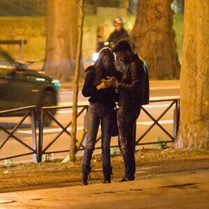 Exclusif - Nabilla Benattia et son compagnon Thomas Vergara prennent des photos à la sortie du restaurant Monsieur Bleu à Paris, le 10 mars 2017.