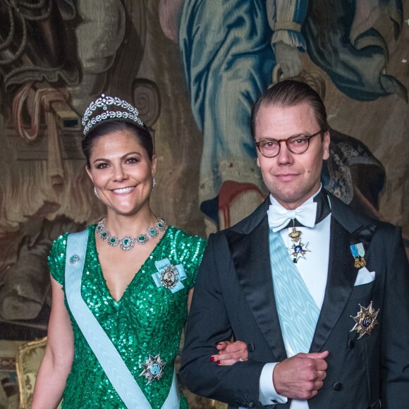 La princesse Victoria (en robe Elie Saab) et le prince Daniel de Suède lors du premier dîner officiel de l'année au palais royal Drottningholm à Stockholm le 23 mars 2017.