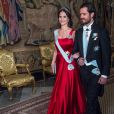 La princesse Sofia, enceinte, et le prince Carl Philip de Suède lors du premier dîner officiel de l'année au palais royal Drottningholm à Stockholm le 23 mars 2017, quelques heures après l'annonce de la naissance prochaine de leur second enfant.