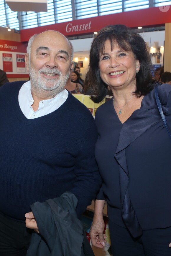 Gérard Jugnot et Anne Sinclair au 32ème Salon du Livre à la Porte de Versailles à Paris, le 25 mars 2017. © CVS/Bestimage