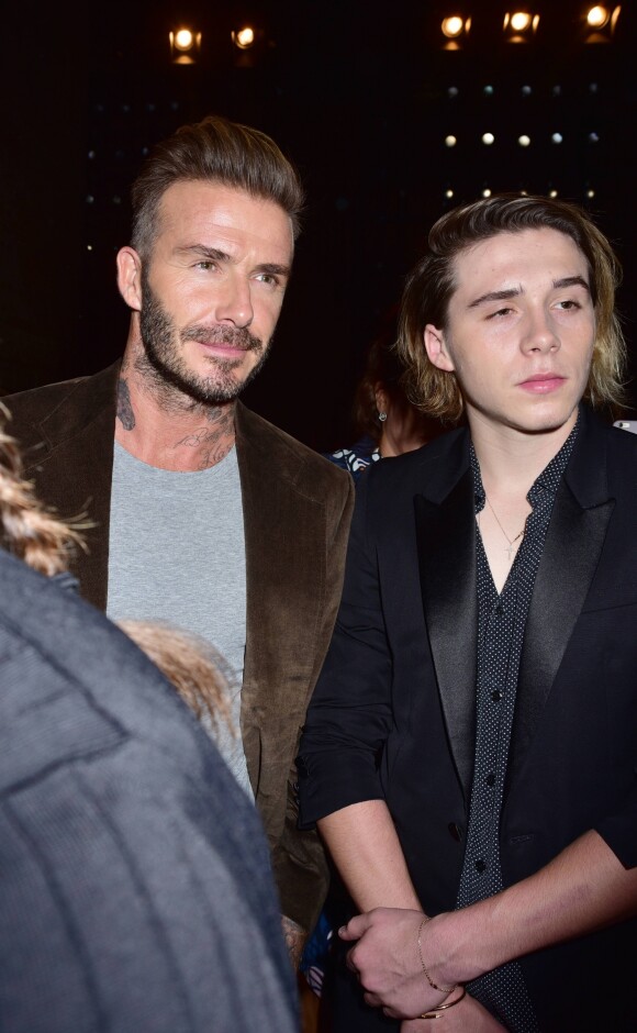 David Beckham et son fils Brooklyn - Célébrités lors du défilé de Victoria Beckham à l'occasion de la fashion week de New York le 11 septembre 2016. © CPA / Bestimage