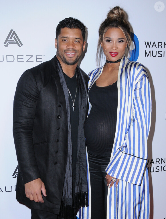 Russell Wilson et sa femme Ciara, enceinte à la soirée Warner Music Group en marge des Grammy Awards au Milk Studio à Los Angeles le 12 février 2017.
