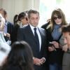 Nicolas Sarkozy et sa femme Carla Bruni-Sarkozy votent pour le premier tour des élections présidentielles au lycée La Fontaine à Paris le 23 avril 2017.