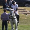 Le prince Harry et le prince William lors de l'Audi Polo Challenge le 7 mai 2017 au club de polo de Coworth Park, à Ascot dans le Berkshire.