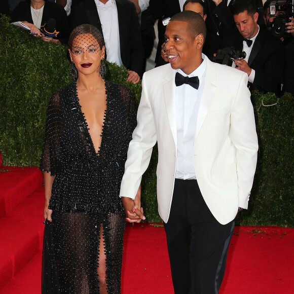 Jay-Z et sa femme Beyonce Knowles à la Soirée du Met Ball / Costume Institute Gala 2014: "Charles James: Beyond Fashion" à New York le 5 mai 2014.