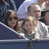 Andrés Iniesta, sa femme Anna Ortiz et leur fille Valeria assistent à un match de tennis à Barcelone. Le 23 avril 2015.