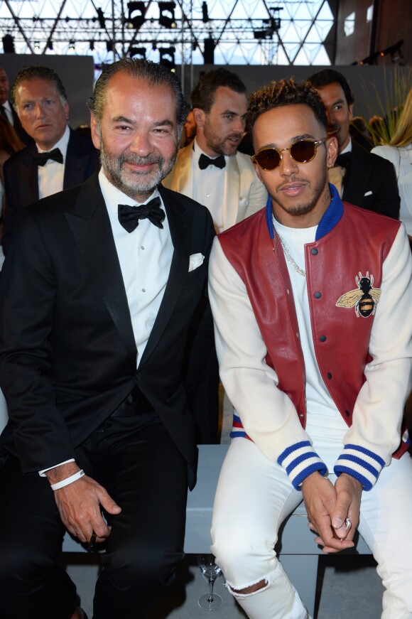 Remo Ruffini (président et PDG de Moncler) et Lewis Hamilton - Défilé de mode de la fondation "Fashion for Relief" à l'aéroport de Cannes-Mandelieu, en marge du 70e Festival International du Film de Cannes. Cannes, le 21 mai 2017.
