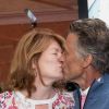 Gérard Holtz et sa femme Muriel Mayette s'embrassent devant les photographes au Village de Roland-Garros à Paris, le 3 juin 2017. © Dominique Jacovides - Cyril Moreau/ Bestimage